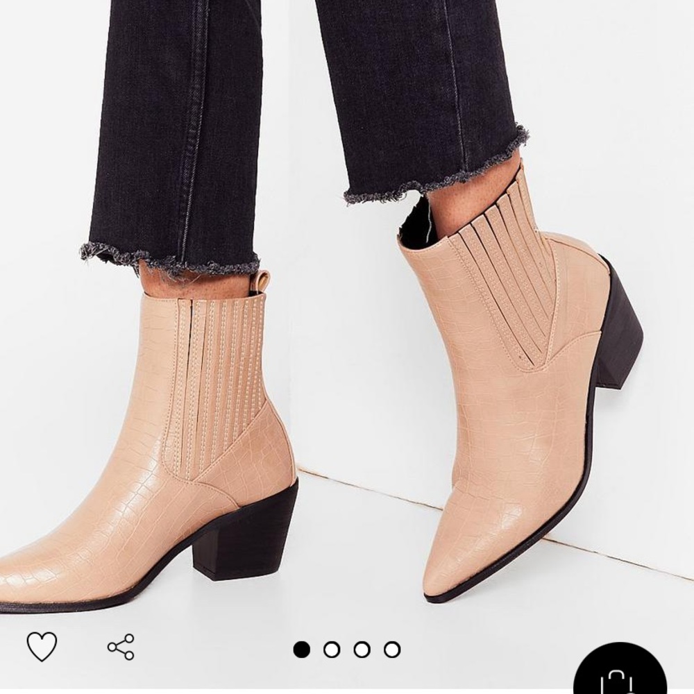 Brand new. Never worn. Faux croc booties from Nasty Gal